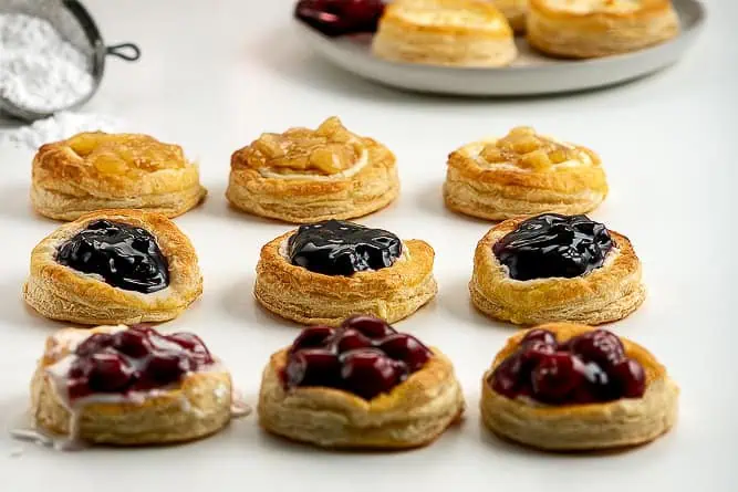 Puff Pastry Cream Cheese Danish(73)-w Puff Pastry Cream Cheese Danish lined up and ready to eat. Yummy.