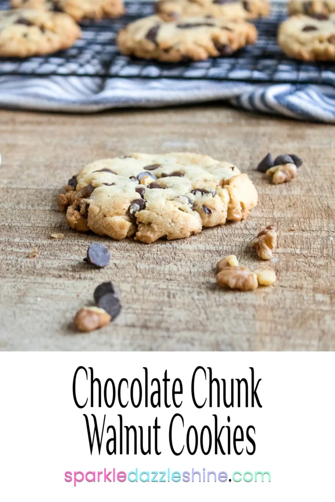 a stack of delicious looking Walnut Chocolate Chunk Cookies sitting on a table