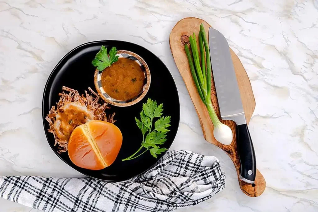 plate of shreded tri tip with gravy you can't help but love