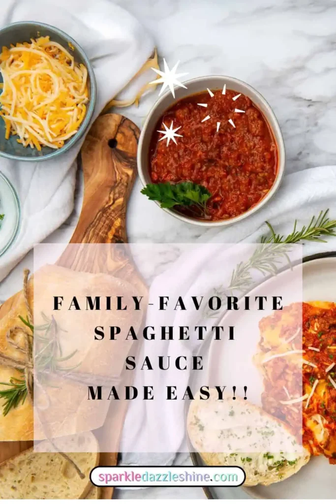 Semi-Homemade Spaghetti Sauce_pin 2, White and gray granite counter top with a bowl of spaghetti sauce. There is also a sliced loaf of french bread, grated cheese and a small plate of lasagna.