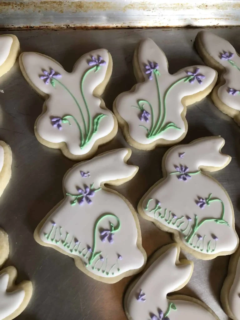 IMG_0097 Bunny shaped sugar cookies, decorated with flowers in lavender and green.