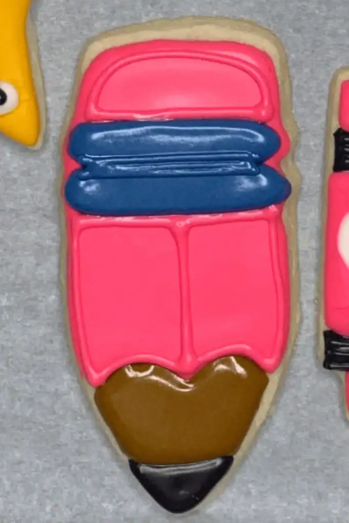 pink pencil sugar cookie