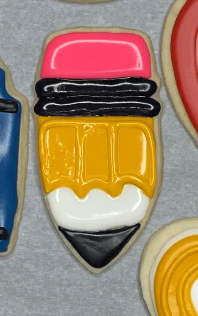 back-2-school sugar cookie decorated as a pencil