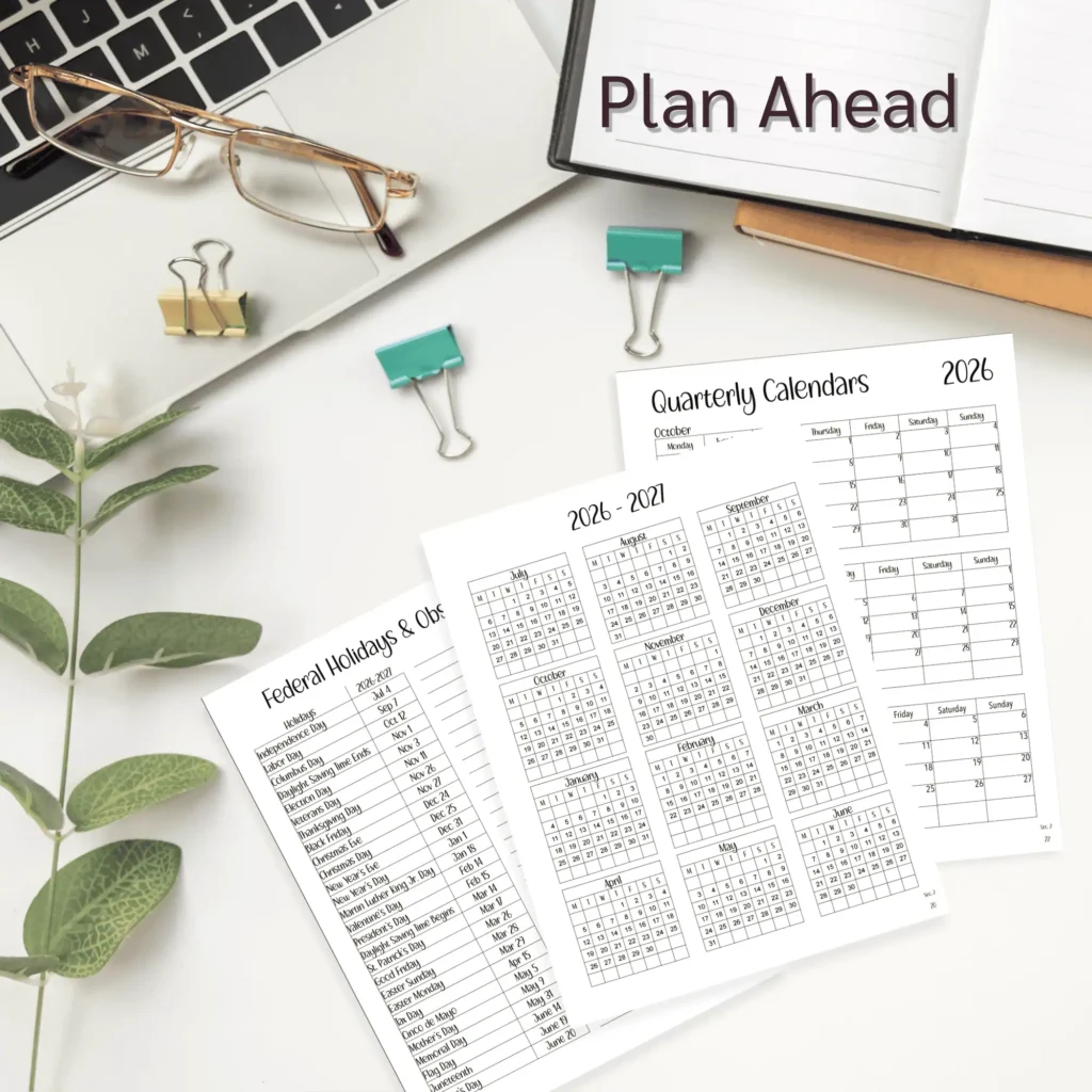 A desk with partial computer showing, and individual pages for the Federal Holidays, 2026-2027 Mini Calendar, and Quarterly Calendar for the 2026-2027 Teacher Planner.